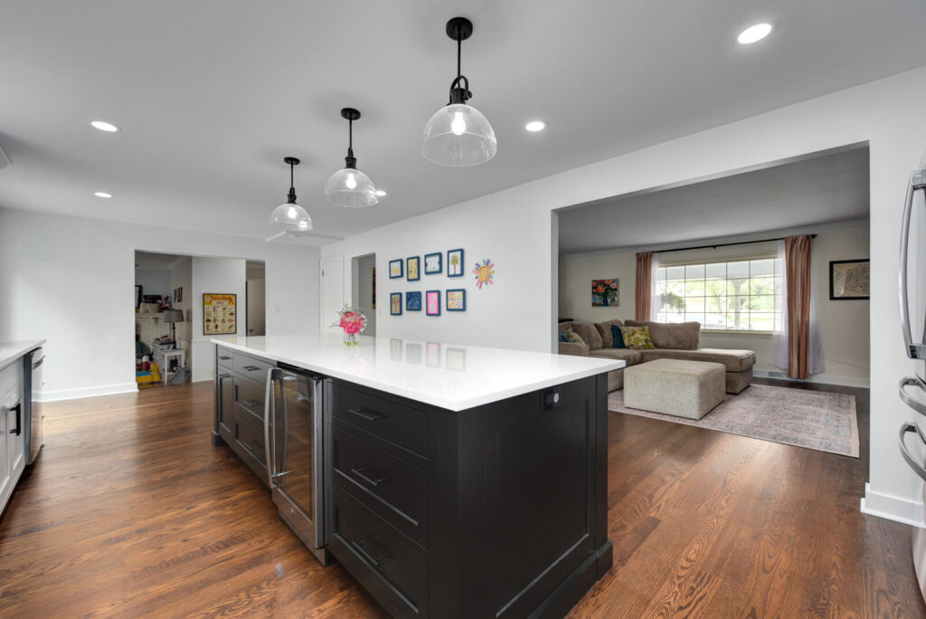 A well-designed kitchen with pristine white cabinets and a polished stainless steel oven, offering a clean and modern look.
