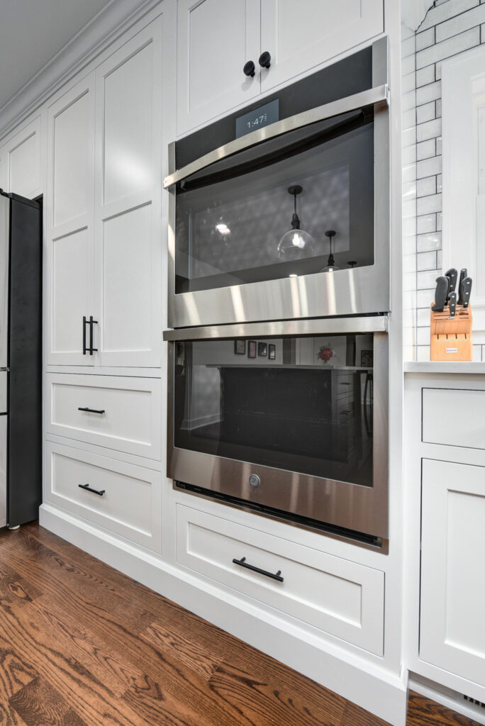Big Black Oven Fitter in Kitchen