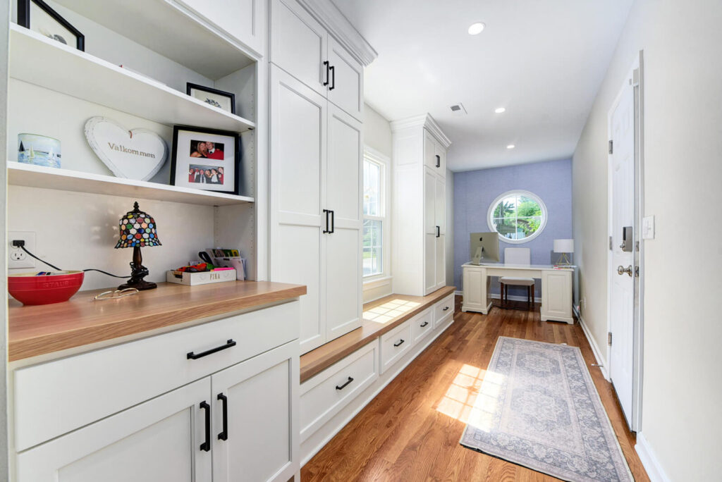 Bright Hallway Featuring White Cabinets