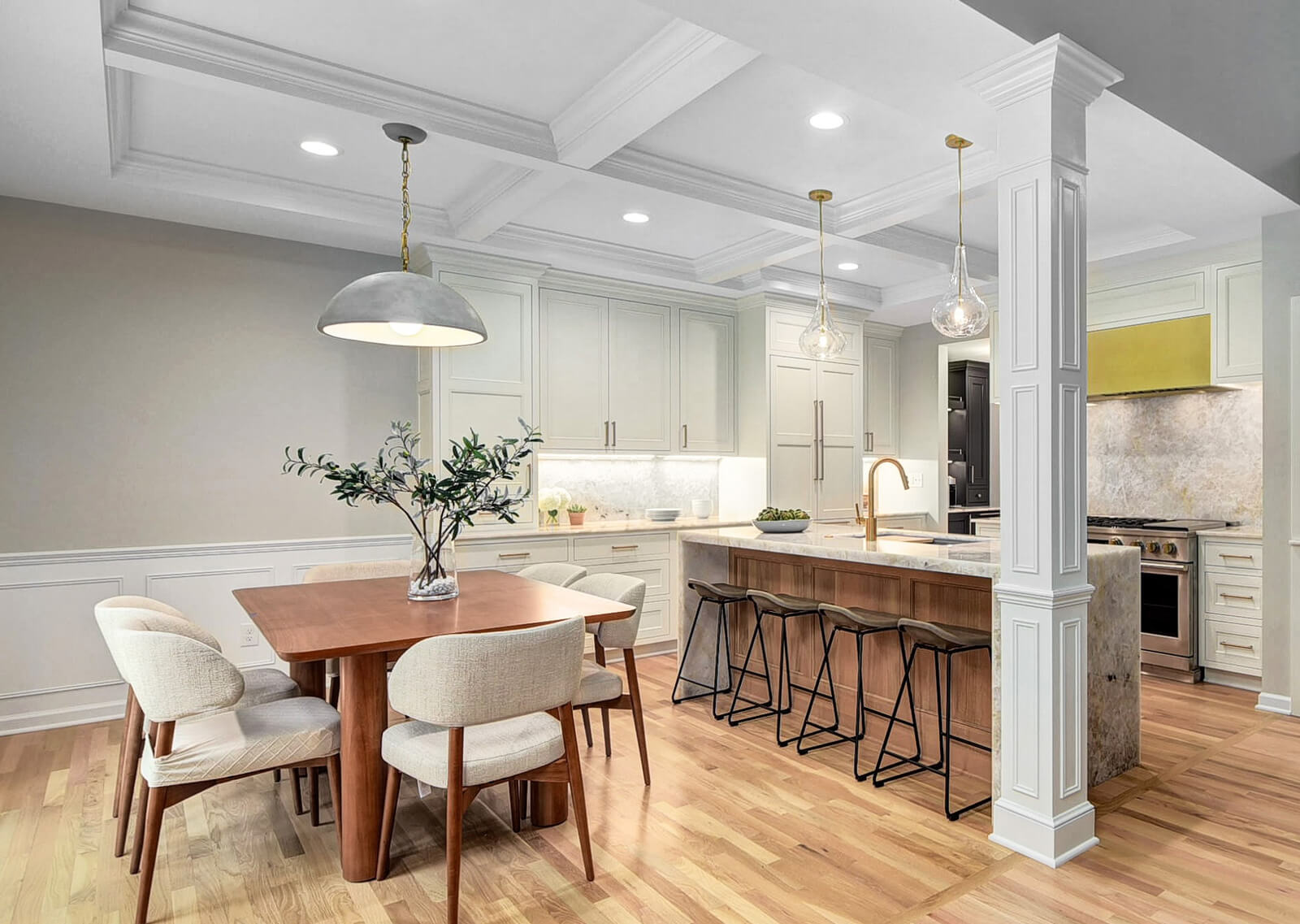 A cozy kitchen featuring a dining table surrounded by chairs